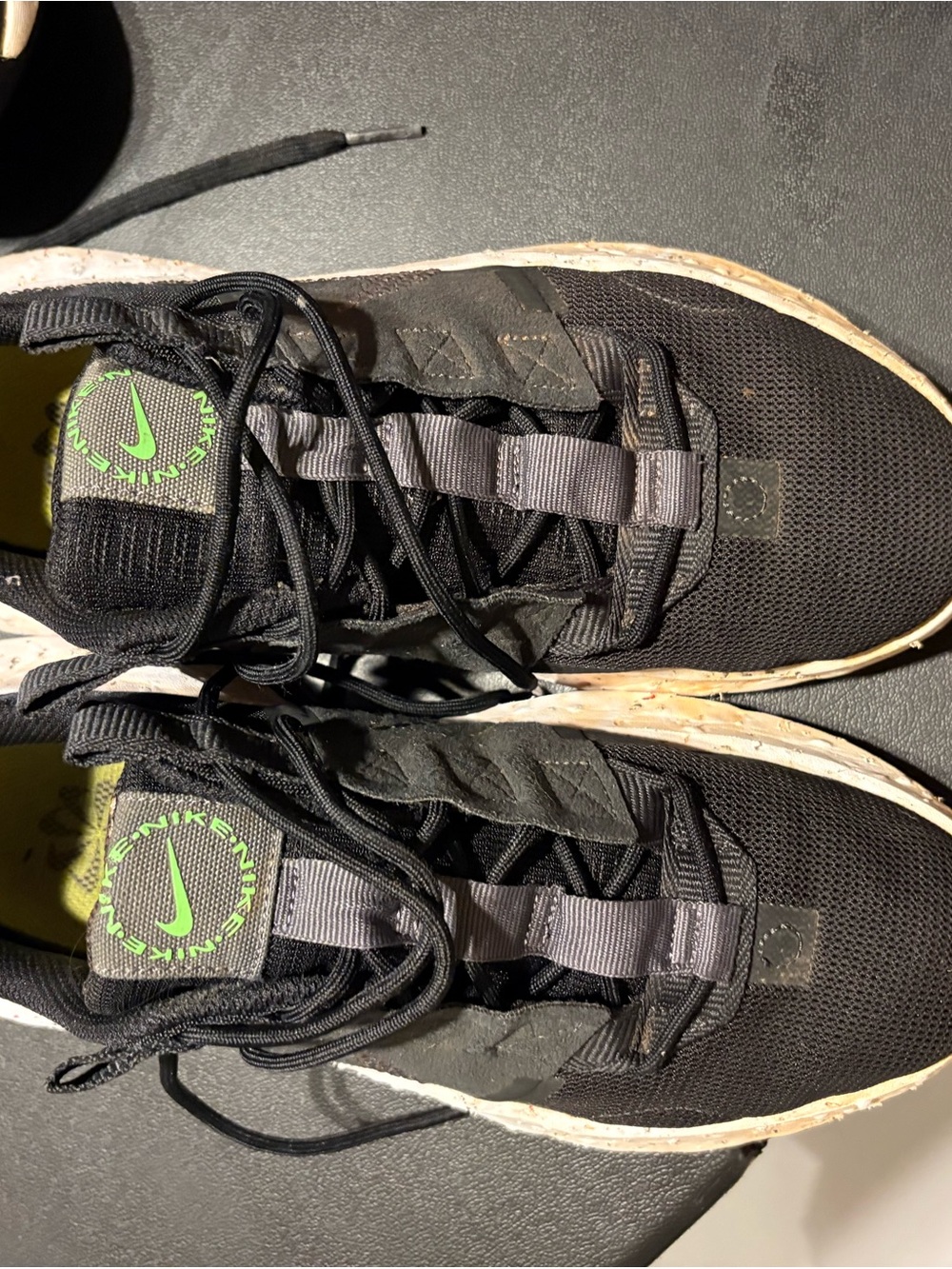 Nike Men’s Black Athletic Shoes with Neon Green Logo